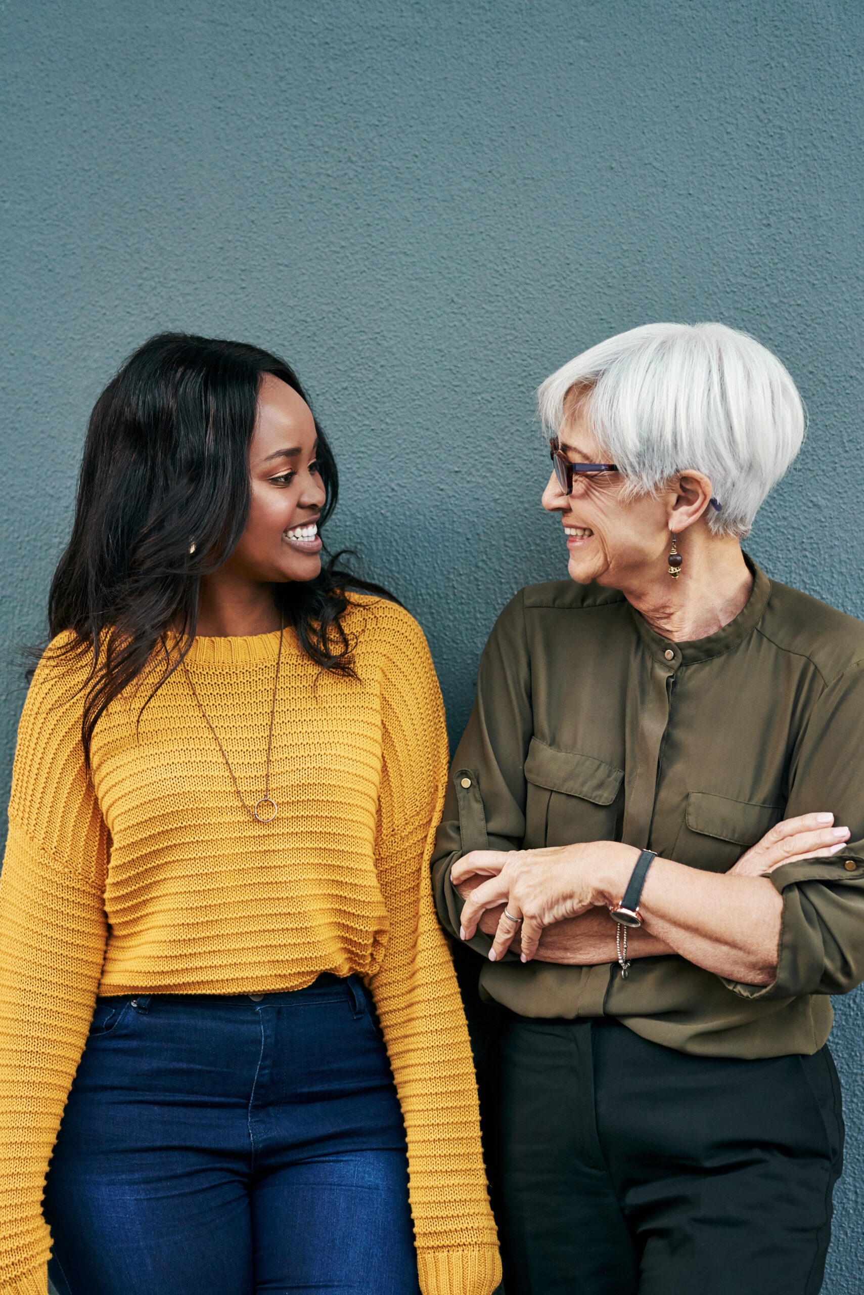 Black woman, senior businesswoman and talking on break or conversation with employee, friend or mentor.